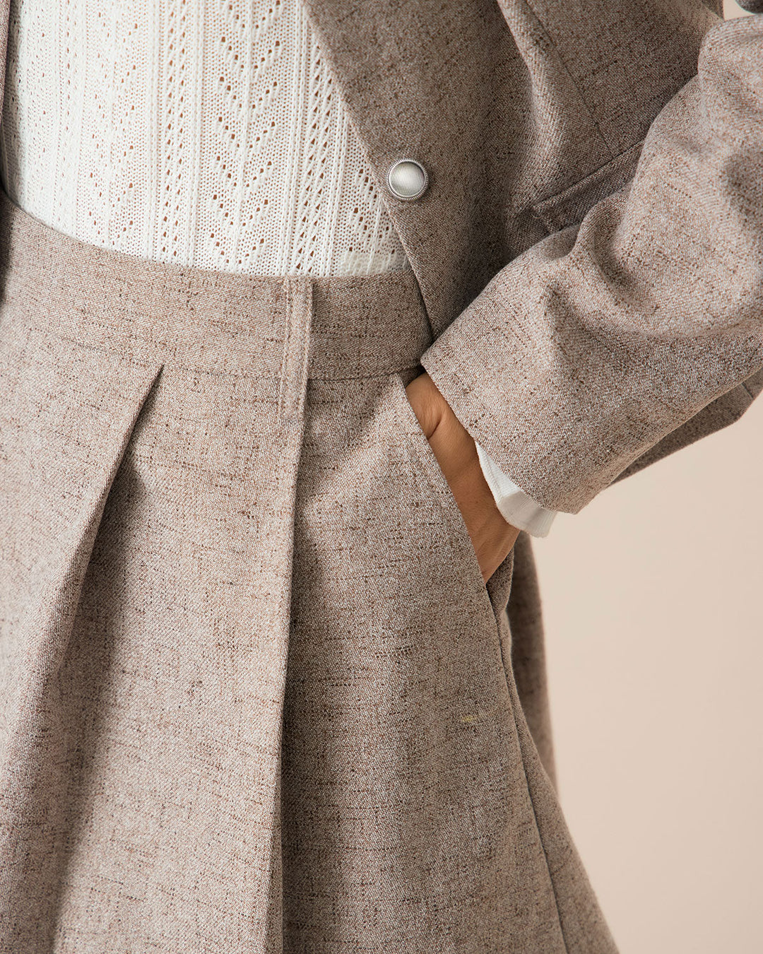 SALE | Mini skirt with pockets and pleats in khaki color