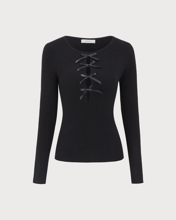 SALE | Dark navy blue top with a boat neckline, bow in front, and knitted texture