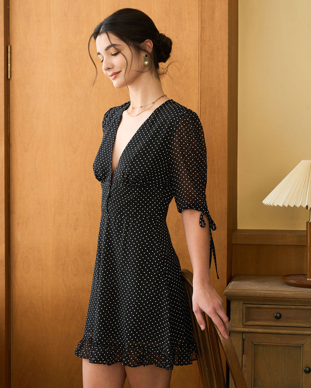 SALE | Short black lace dress with deep V neckline and elegant polka dots