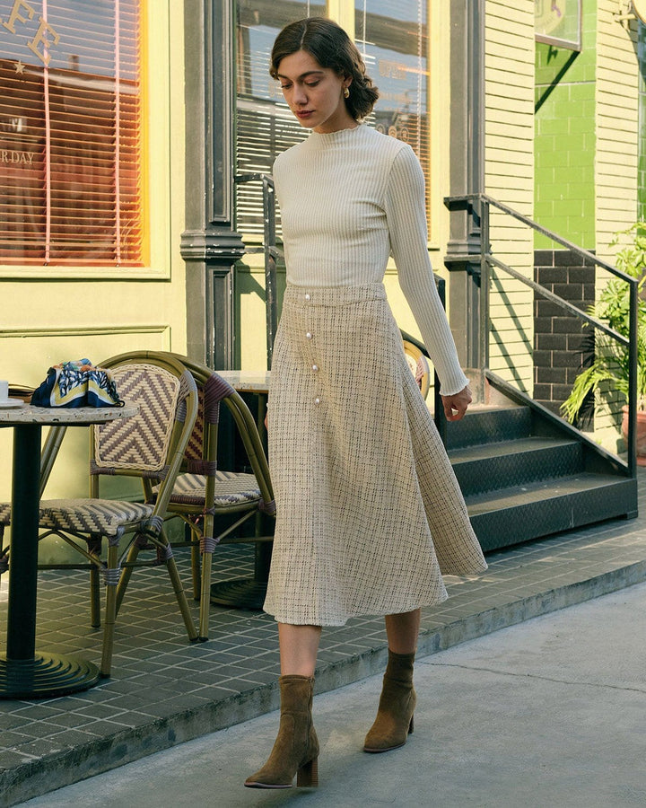 SALE | High-waisted tulle skirt with pearl buckle details