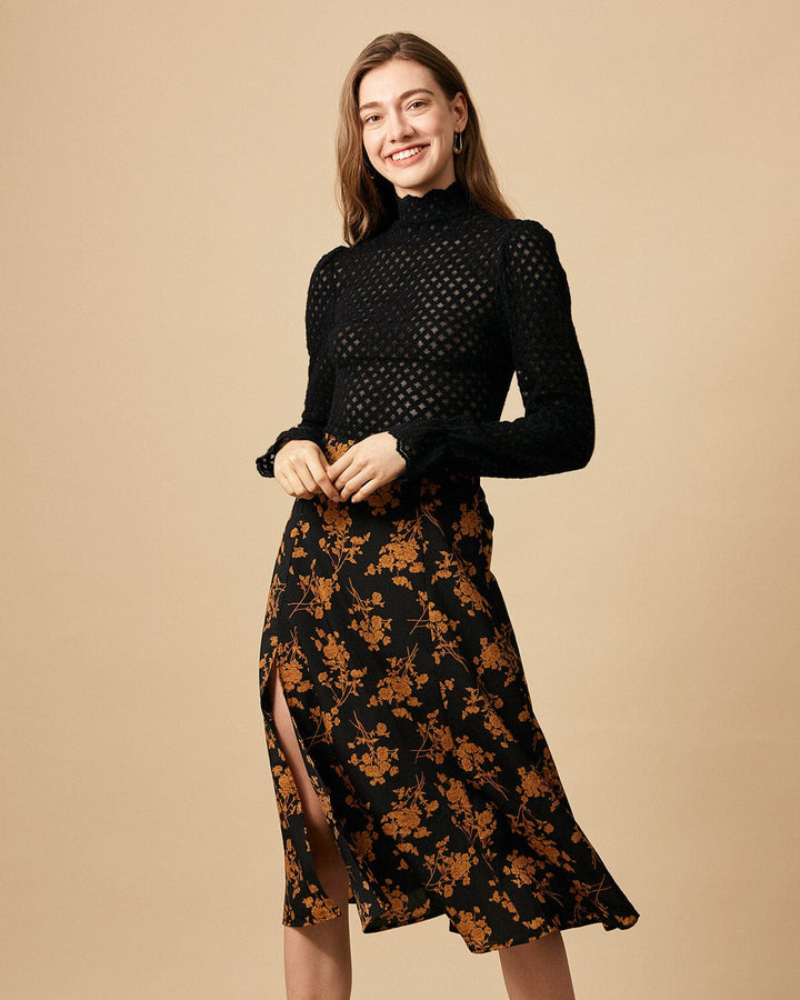 SALE | High-waisted flared skirt with an elegant floral slit