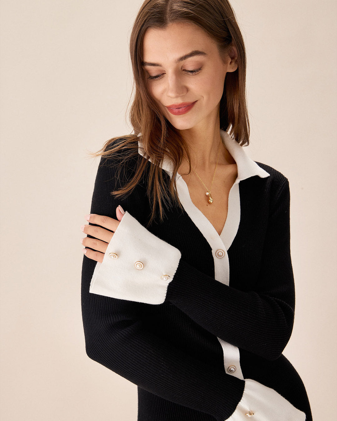 SALE | Black Knit Dress with Contrasting Balloon Sleeves for a Chic and Elegant Look