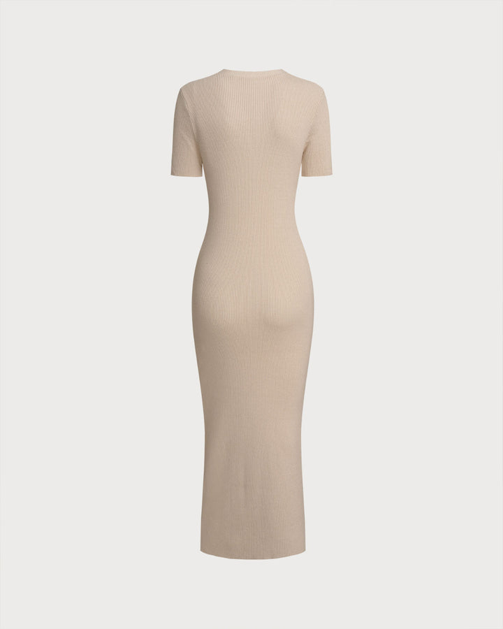 SALE | Fitted knit dress with V-neck and apricot accents